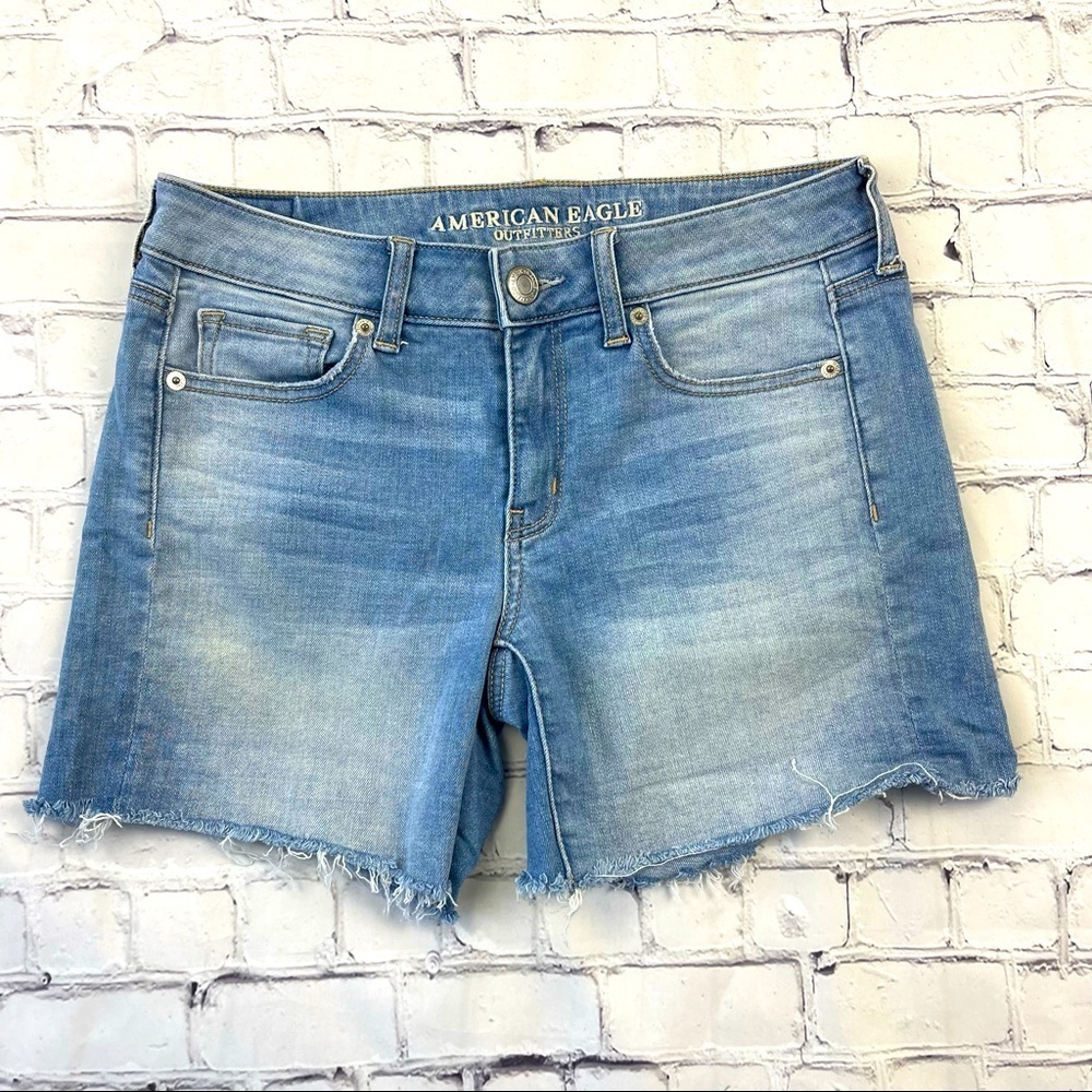 ✅ American Eagle Woman’s Super Stretch X Blue Midi Denim shorts size 4 Raw Hem